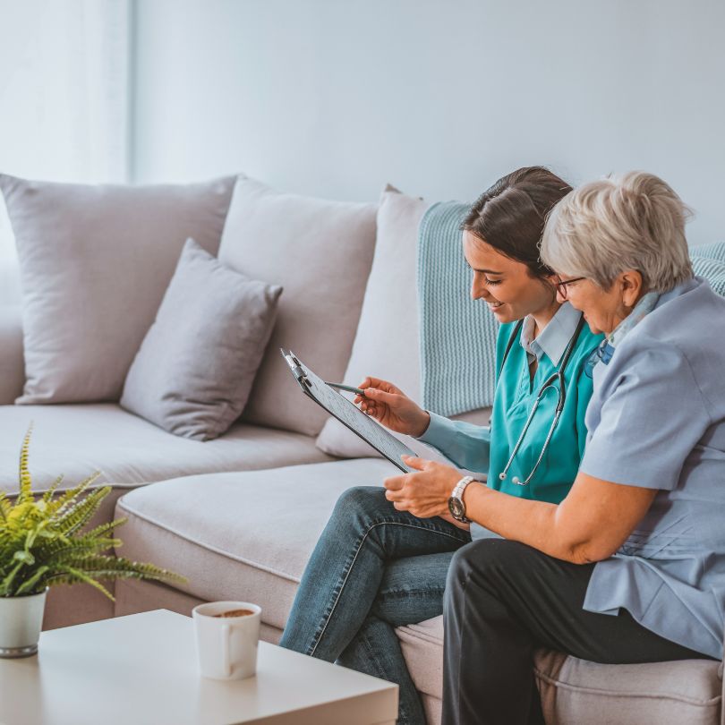 Caregiver assisting senior at home