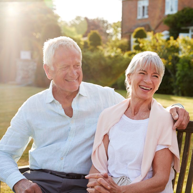 Happy elderly couple enjoying independence at home